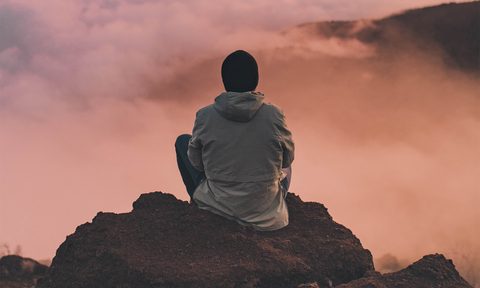 Man relaxing and meditating