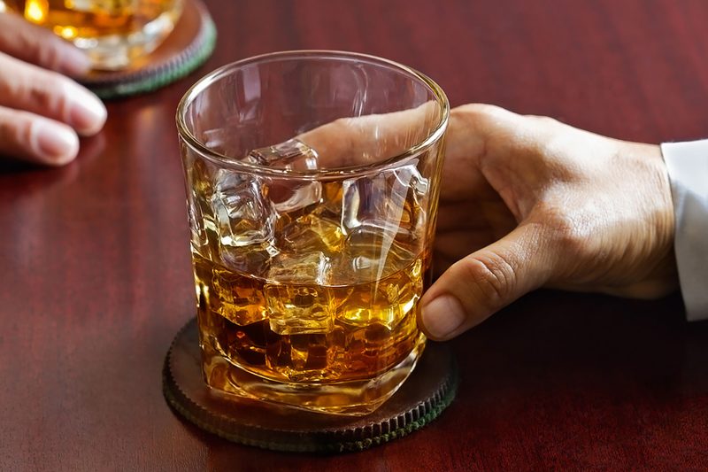 drinking whiskey on the rocks