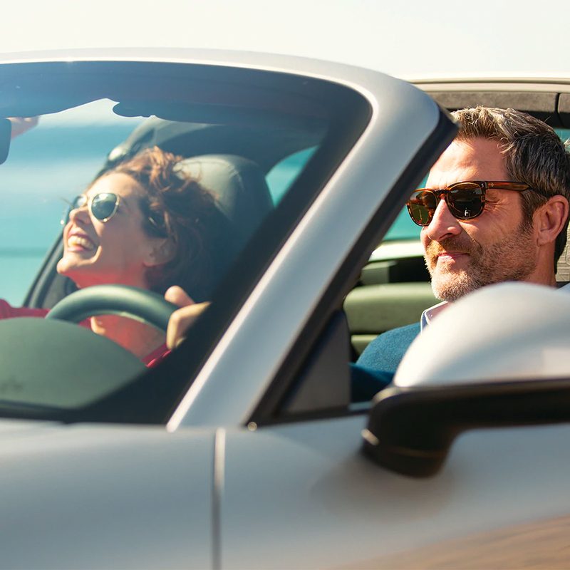Man and woman in a convertible