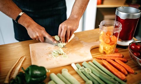 Man cutting vegetables