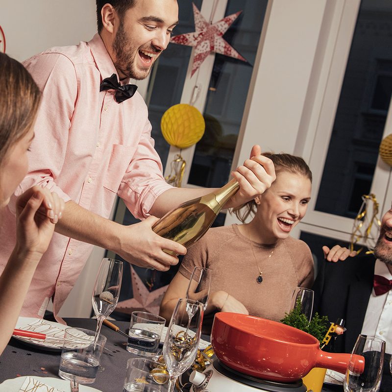opening serving champagne bottle party