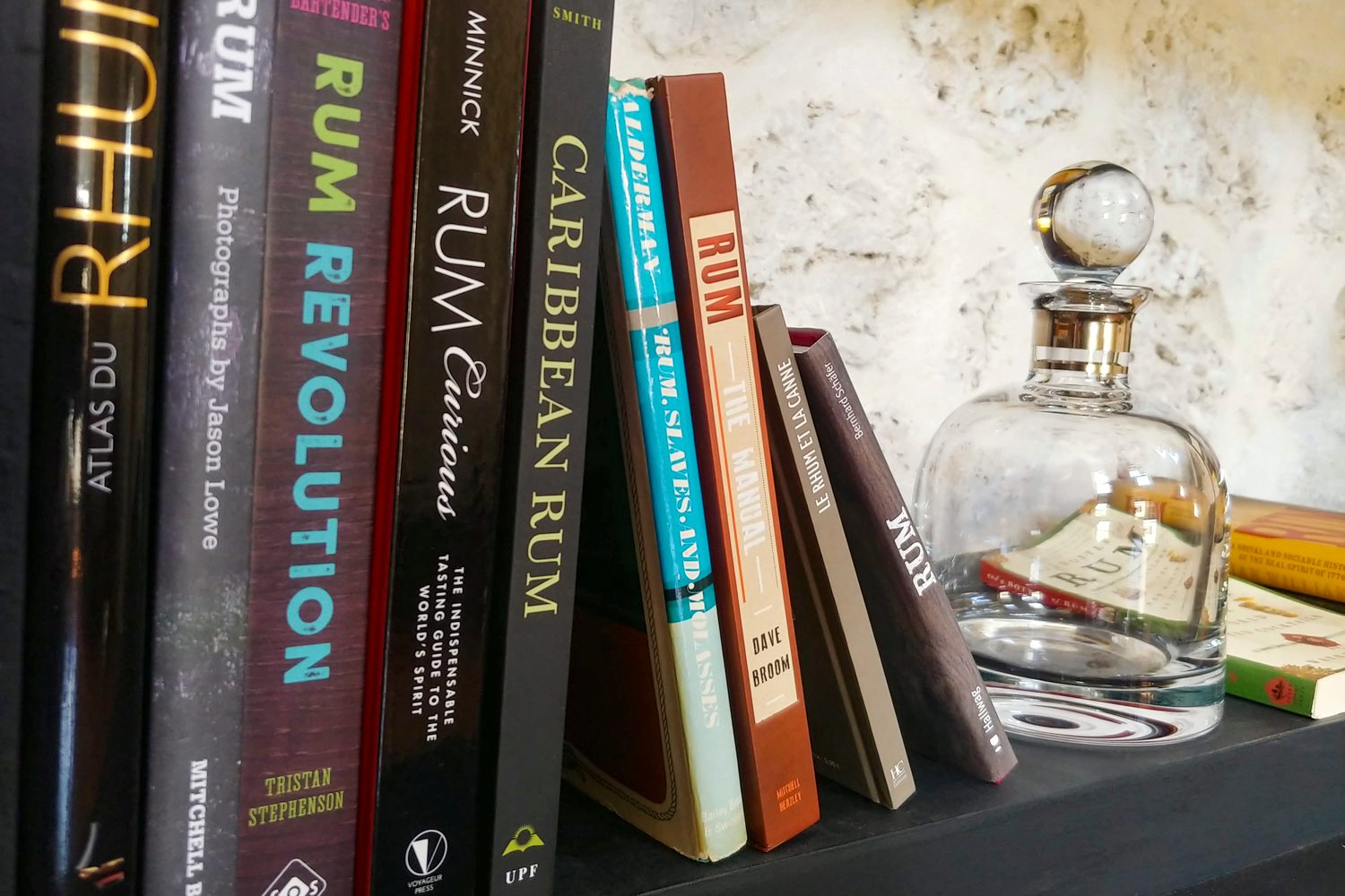 barbados bars restaurants distlleries guide rum books on bookshelf at mount gay distillery 10