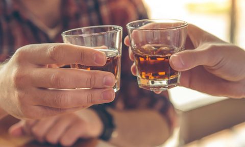 A whiskey shot cheers