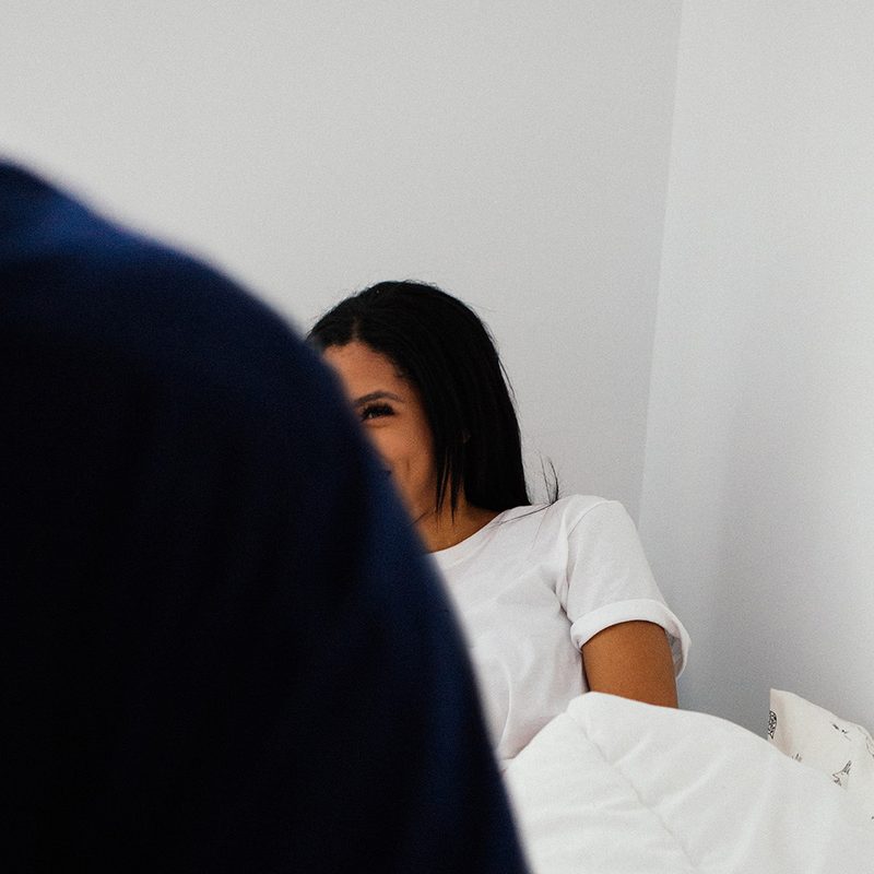 couple bed smile