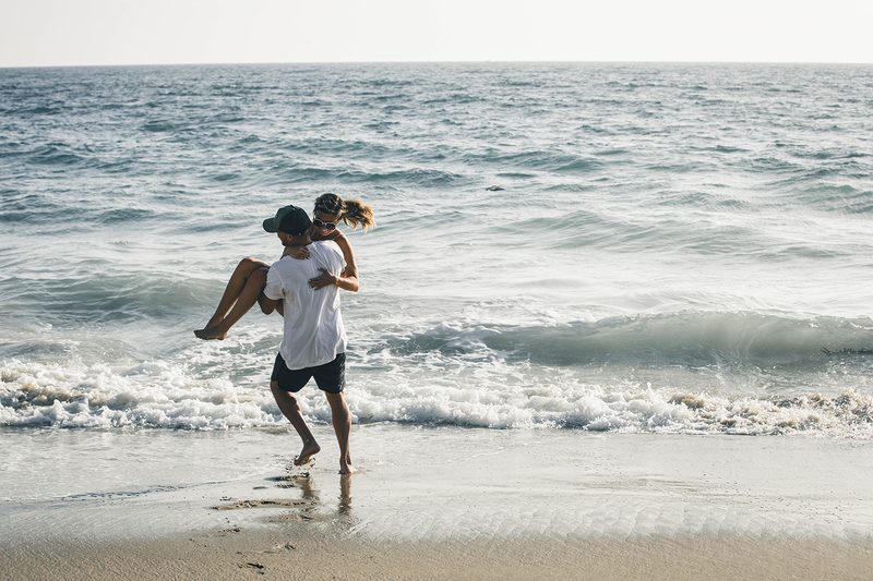 couple relationship fun beach