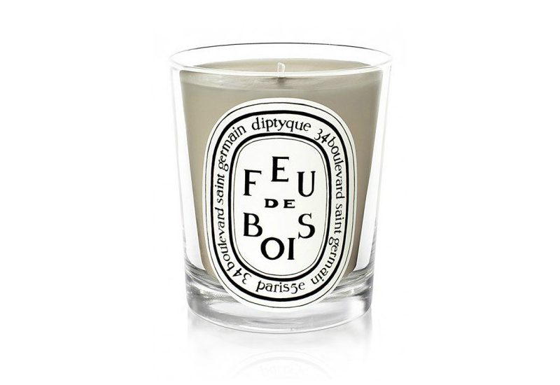 Diptyque Feu de Bois Candle on a white background.