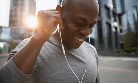 Man listening to music while working out.