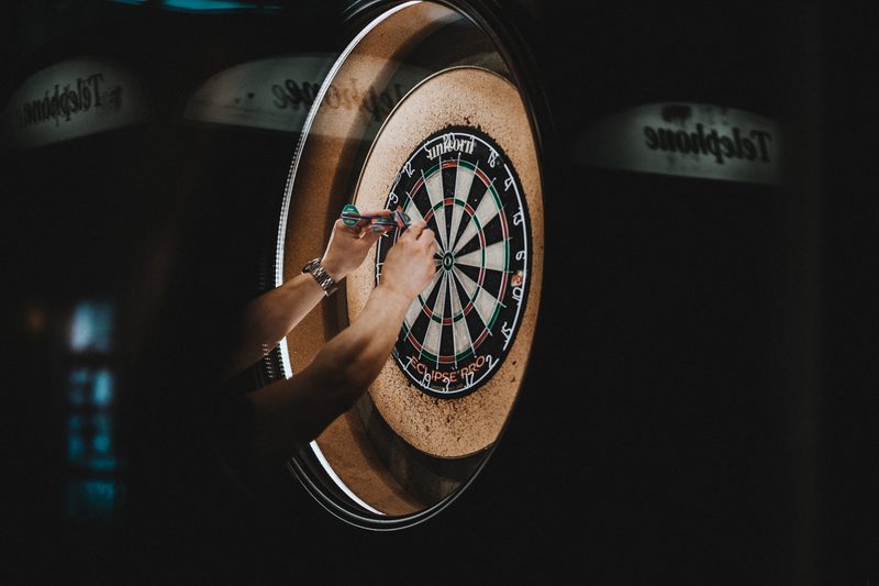 man playing darts