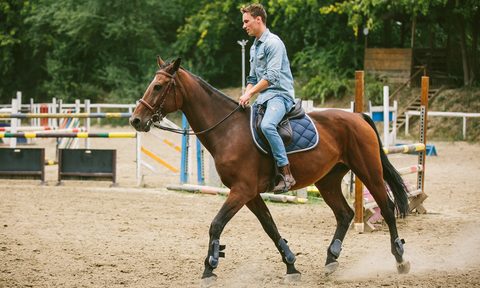 man riding horse