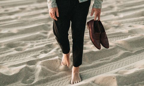 what to wear with mens loafers man in hand barefoot