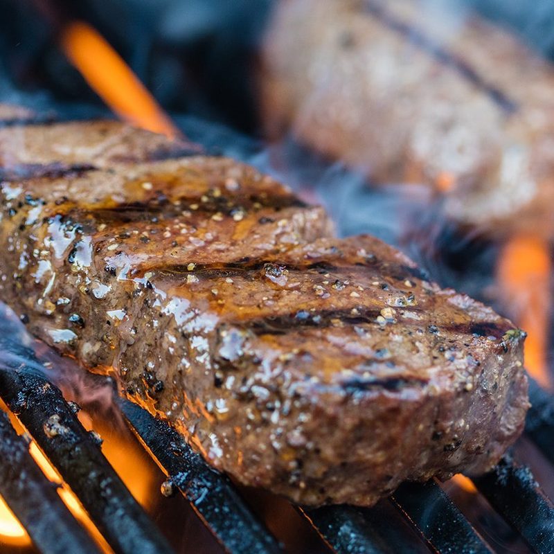 Sirloin steak on a grill