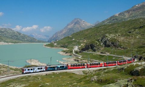 travel switzerland like a gentleman aboard the luxury glacier express bernina lago bianco