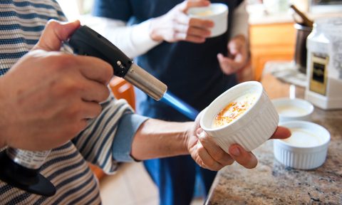 Blowtorch on creme brulee