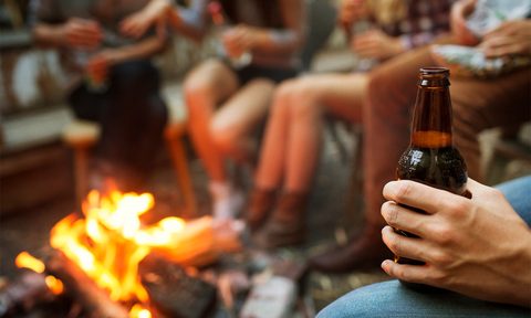 camping beer accessories with getty images