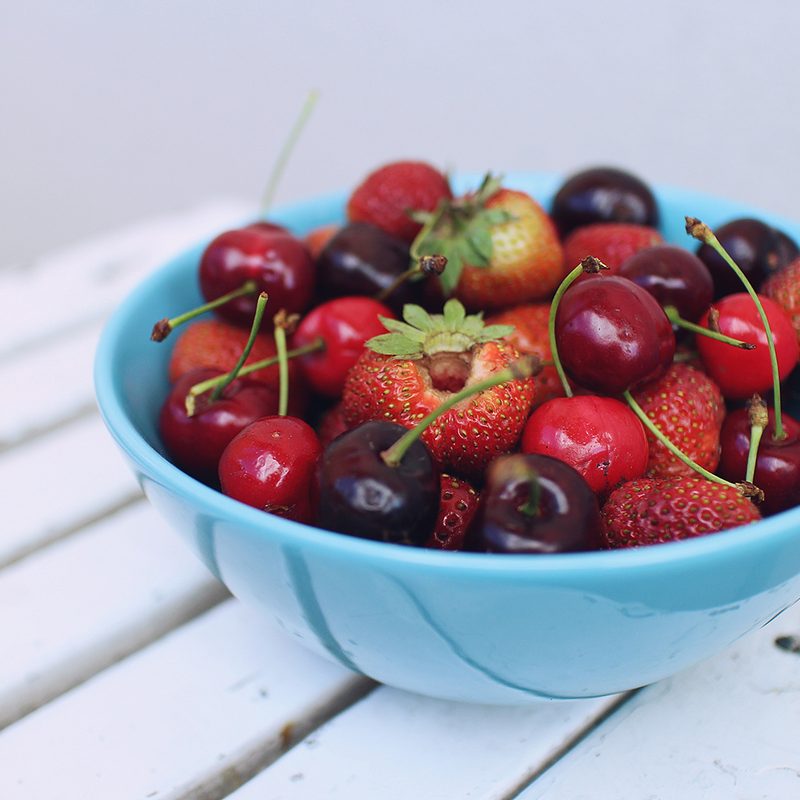 Strawberries and cherries in a bowl