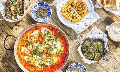 quintessential israeli cuisine dishes shakshuka brunch at haachim restaurant tel aviv v2