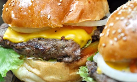 Close-up of two cheeseburgers