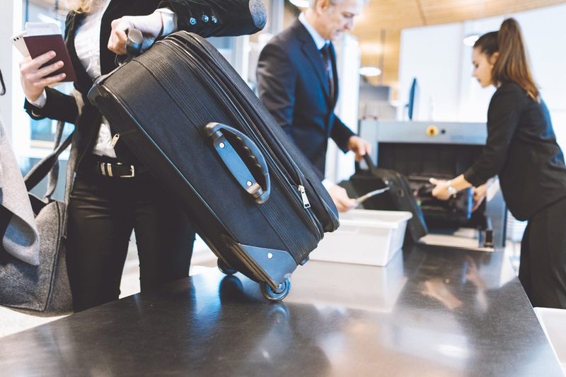 Airport security checking bags.