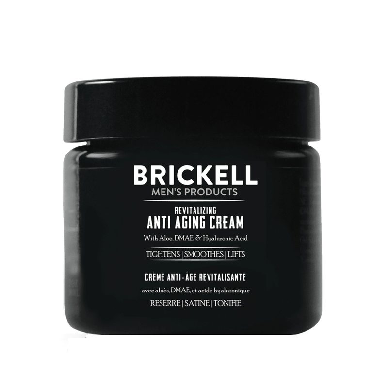 Brickell anti aging cream in a black container on a white background.
