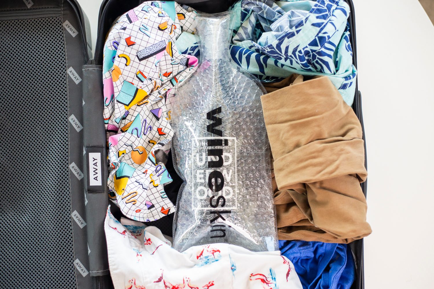 Packing wine in a suitcase