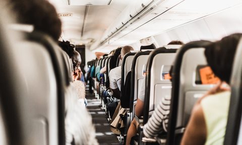 airplane flight aisle passengers