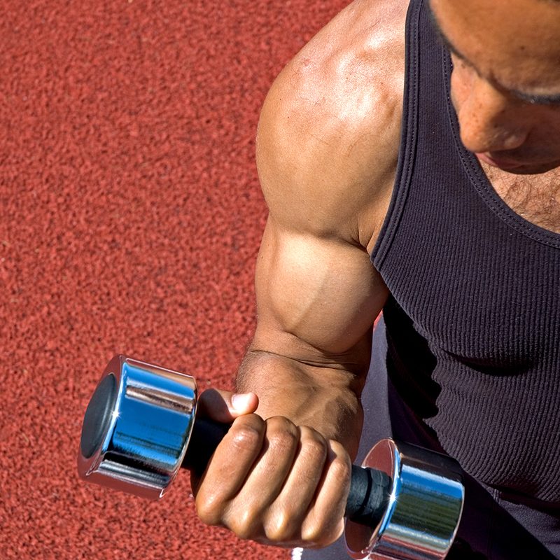 Man doing bicep curls.