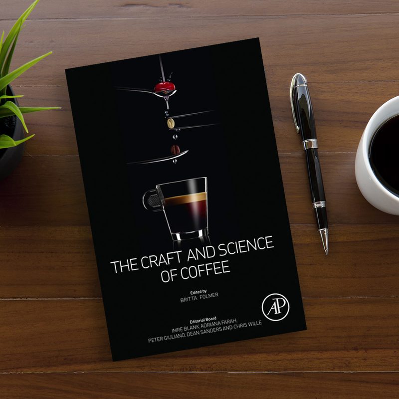 The Craft and Science of Coffee by Britta Folmer on a wooden table.
