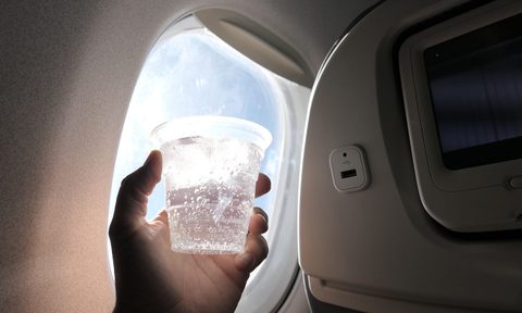 in-flight drink on an airplane