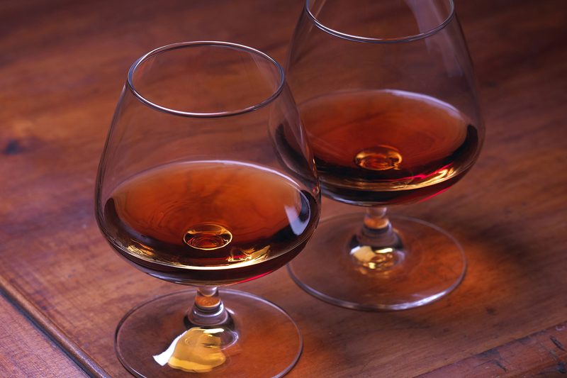 Two snifters filled with cognac.