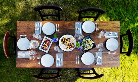 how to set the table etiquette fancy setting outdoors getty images