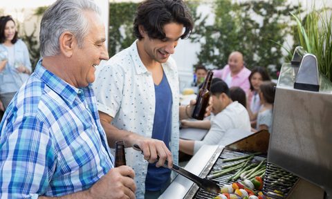 Father and son grilling