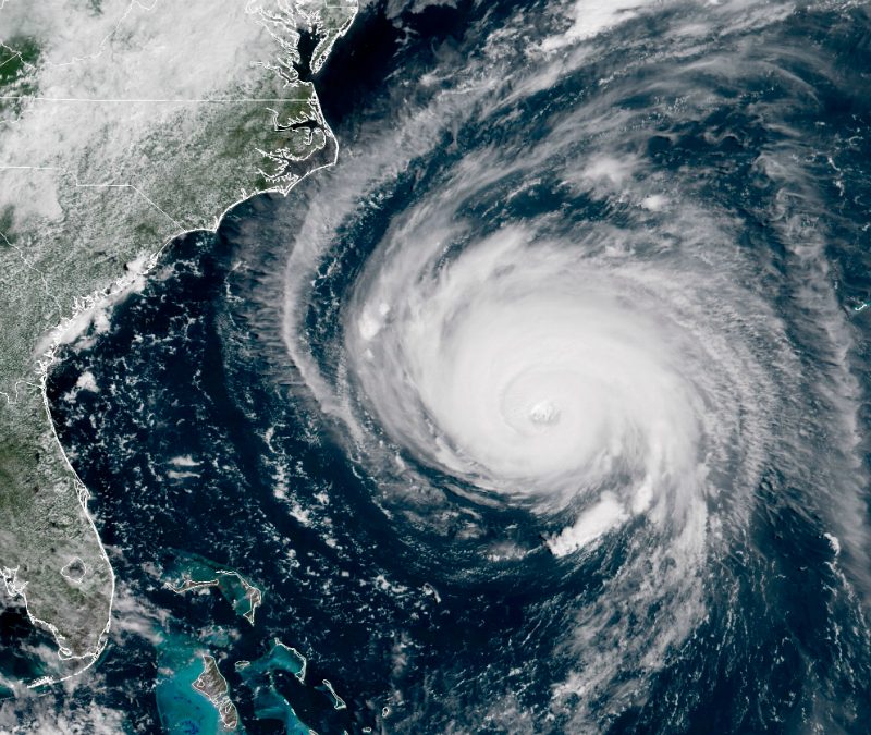Hurricane Florence Bears Down on U.S. East Coast IN SPACE - SEPTEMBER 12: In this satellite image provided by U.S. National Oceanic and Atmospheric Administration (NOAA), Hurricane Florence churns through the Atlantic Ocean toward the U.S. East Coast on September 12, 2018. Florence slowed its approach to the U.S. today and was forecast to turn south, stalling along the North Carolina and South Carolina coast and bringing with it torrential rain, high winds and a dangerous storm surge tomorrow through Saturday. (Photo by NOAA via Getty Images)
