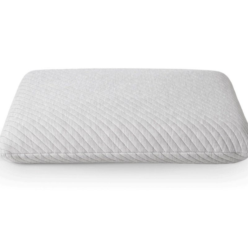 Leesa memory foam pillow over a white background.