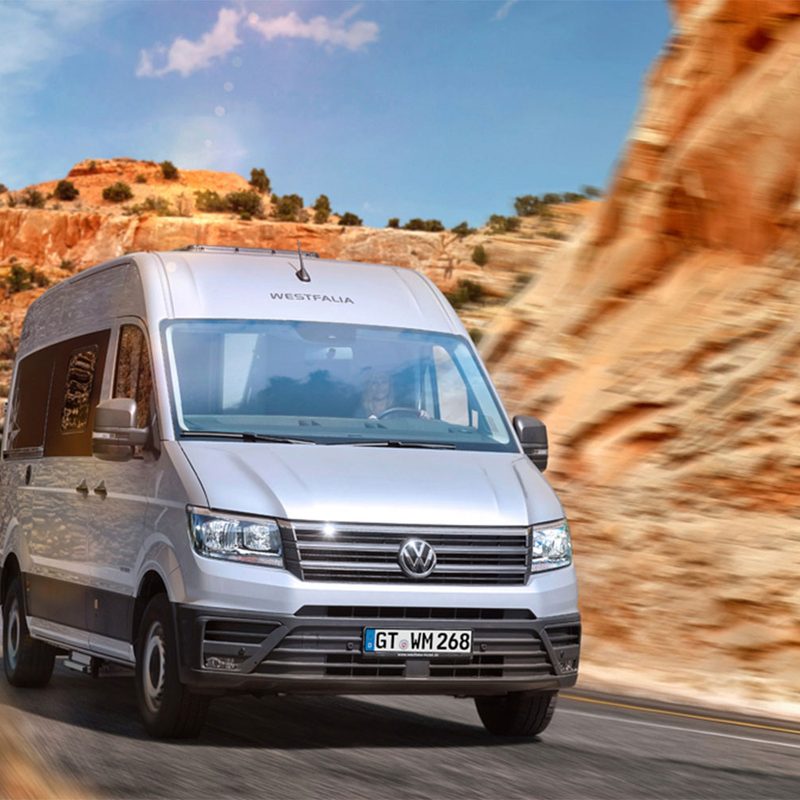 Westfalia Sven Hedin CUV driving on a windy road between canyons.