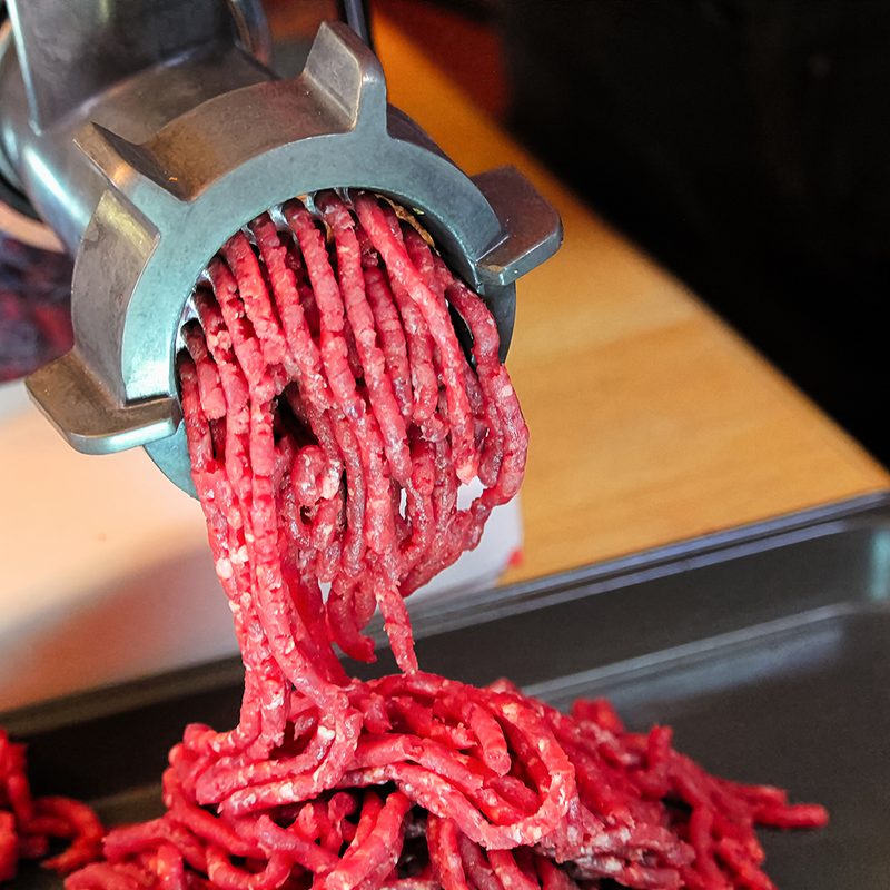 Meat in a grinder
