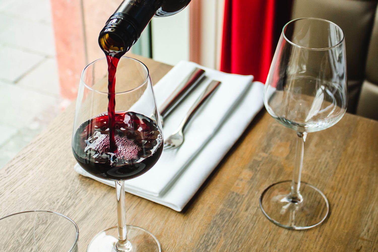 Red wine pouring.