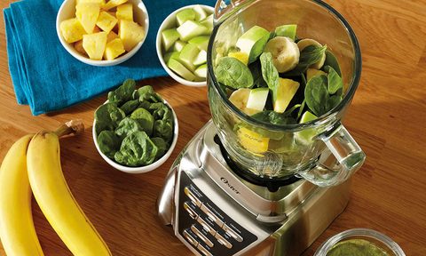 Blending food in a blender.