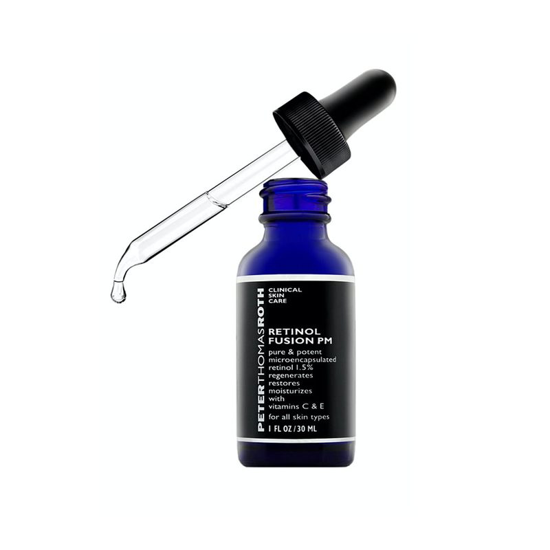 A small bottle of Peter Thomas Roth Retinol Fusion PM Night Serum on a white background.