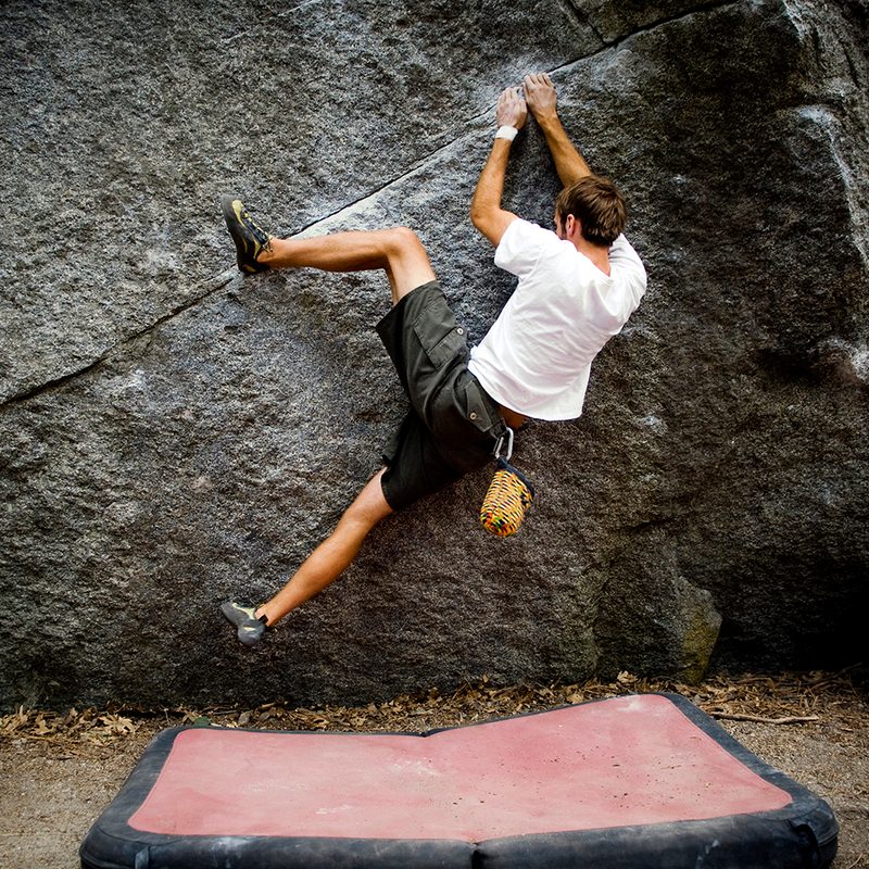 Bouldering climbing outdoors crash pad