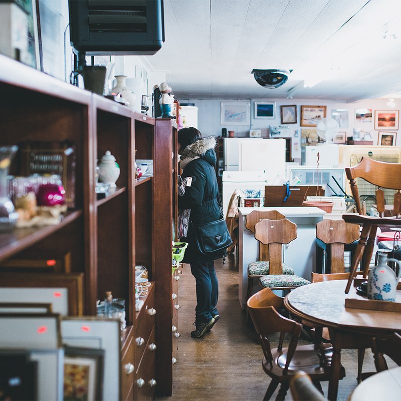 Person thrift shopping