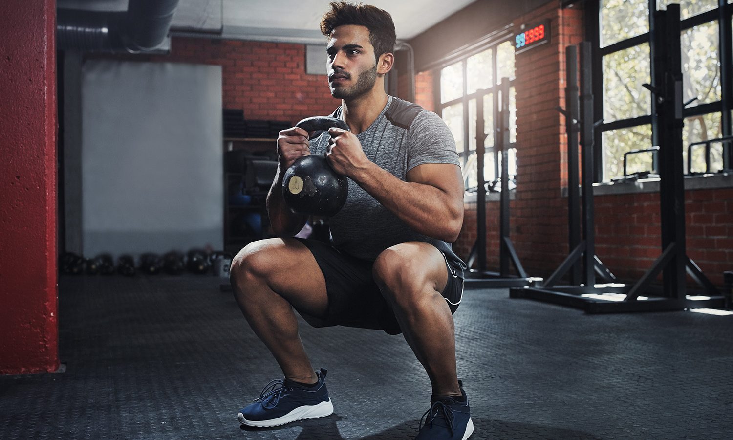 Man doing goblet squats