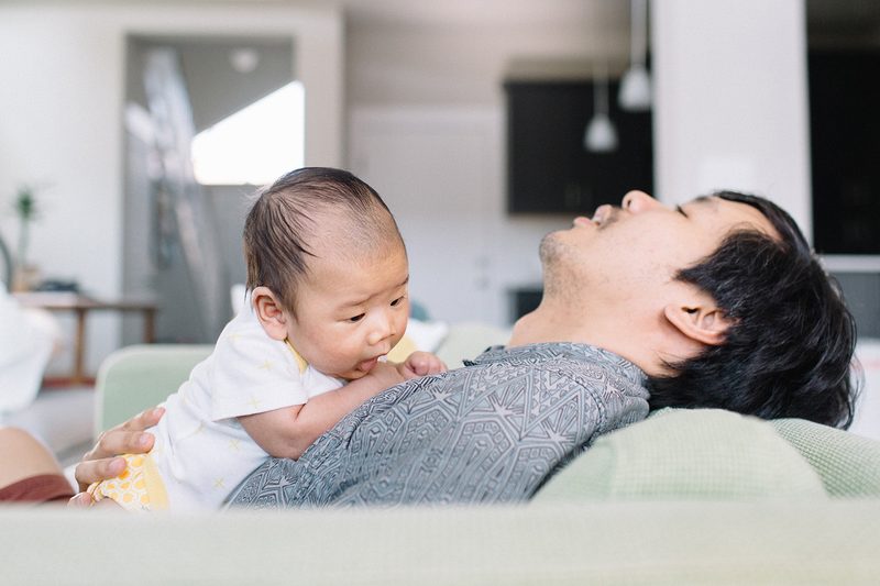 new dad sleeping baby