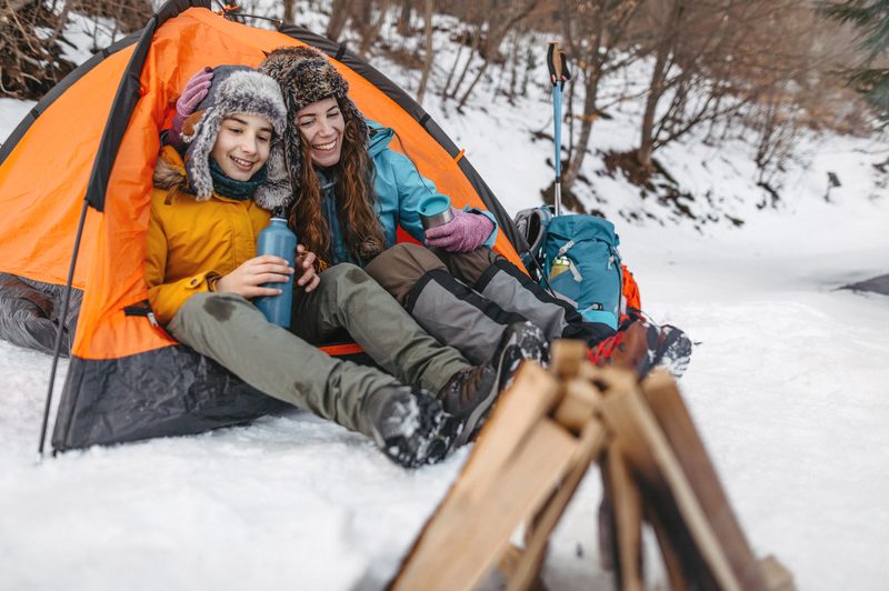 Family camping in the winter time
