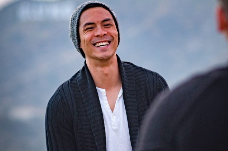 man wearing henley shirt