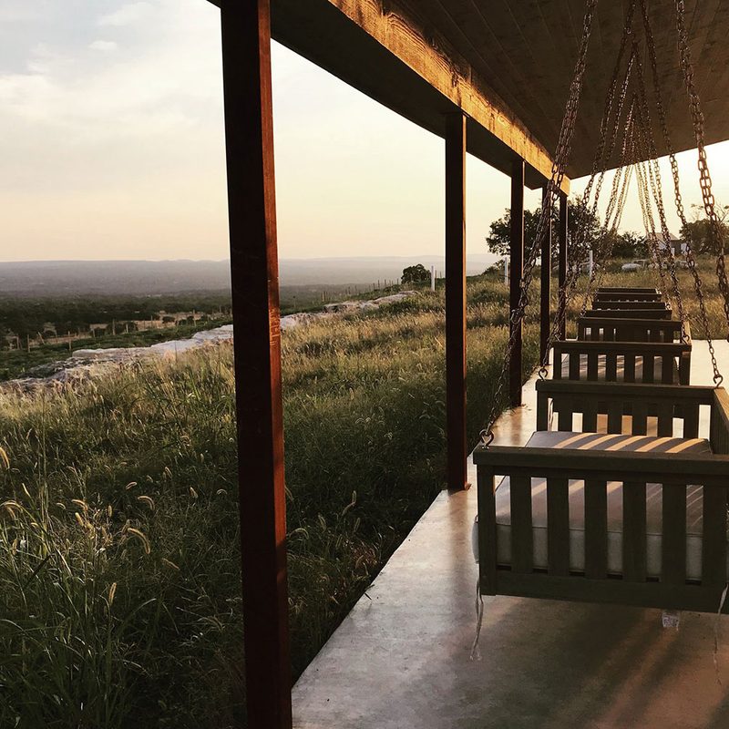 A view of the porch swings at Southold Farm + Cellar.