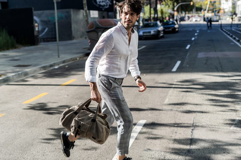 man wearing an oxford shirt