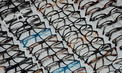 Rows of eyeglasses.