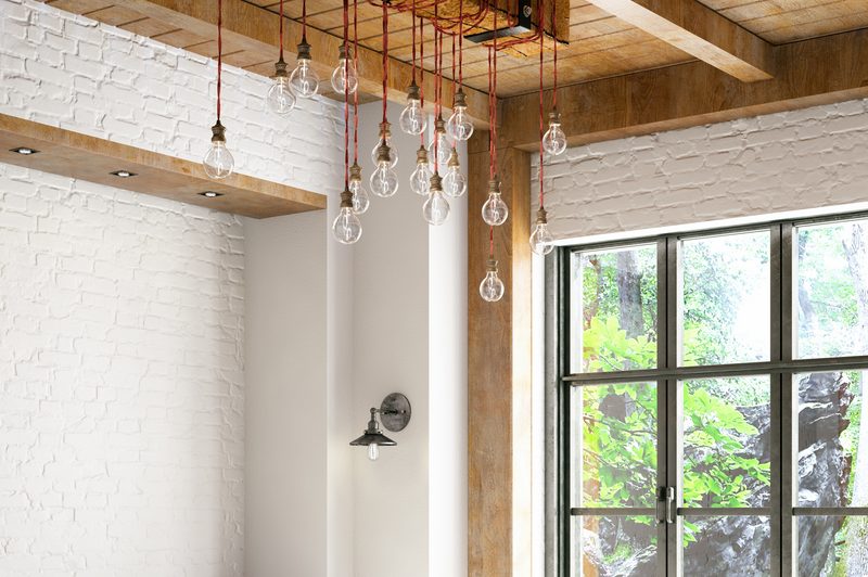 loft with vaulted ceilings and Edison style bulbs