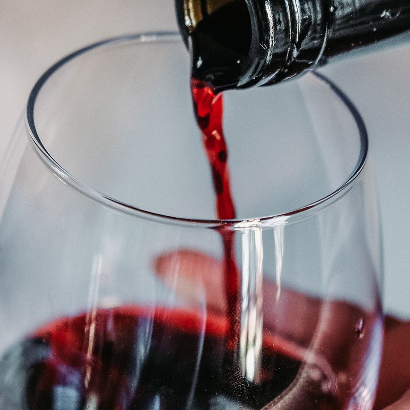 A red wine glass and wine