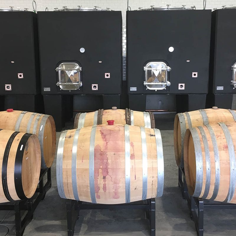 Force Majeure wine barrels at the winery.